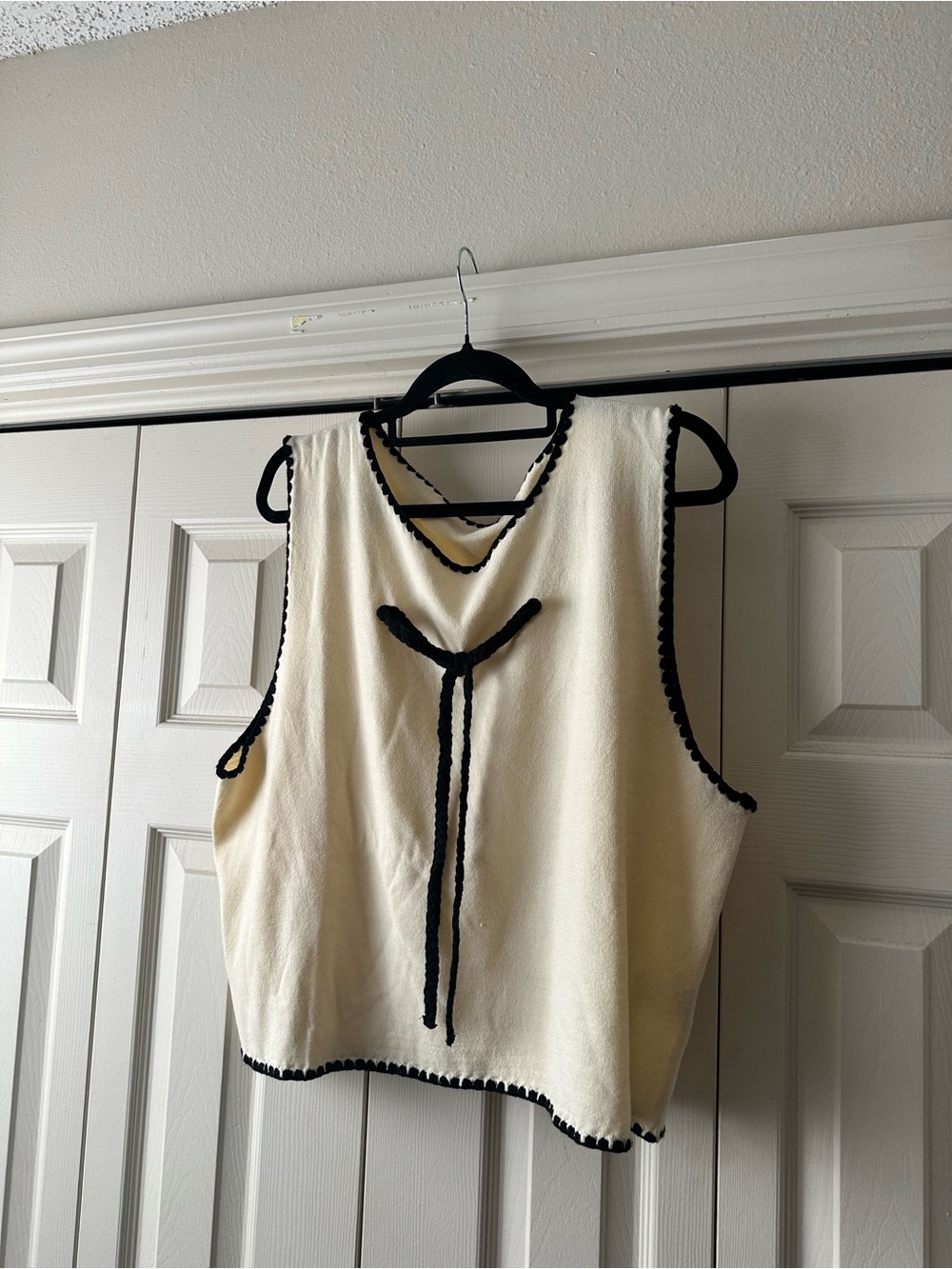 Women's Cream Sleeveless Knit Top with Black Trim